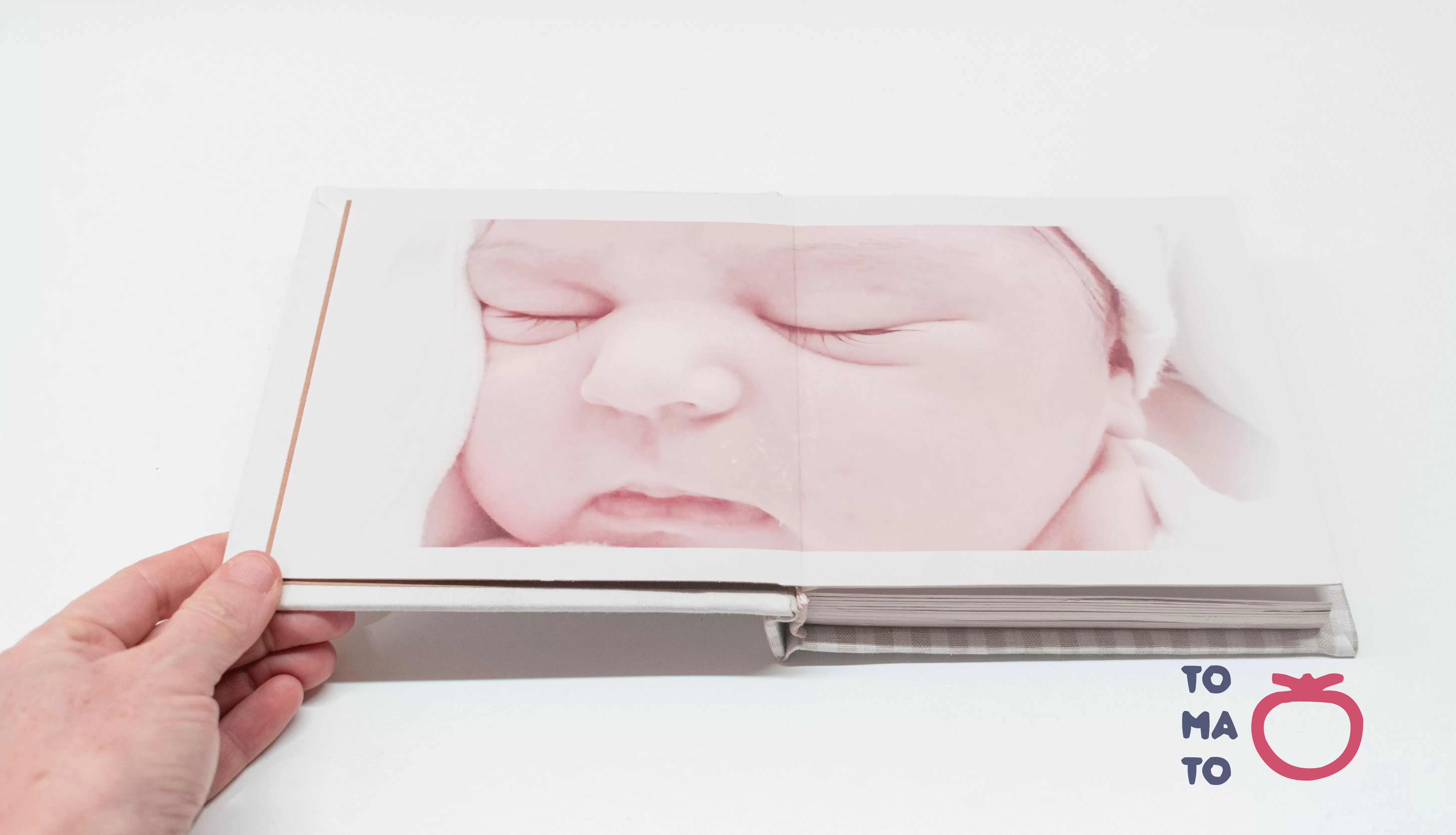 fotolibro del bebé, composicón de página del fotolibro